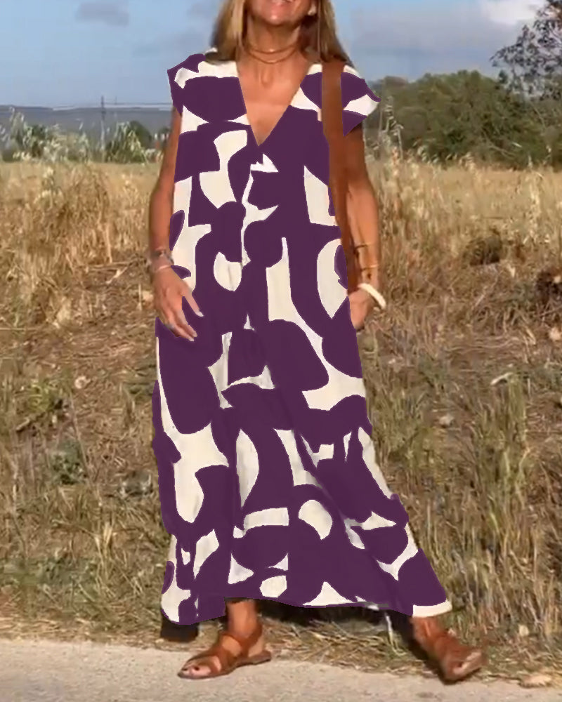 Vestido estampado con escote en V y corte fluido – STEPHARA