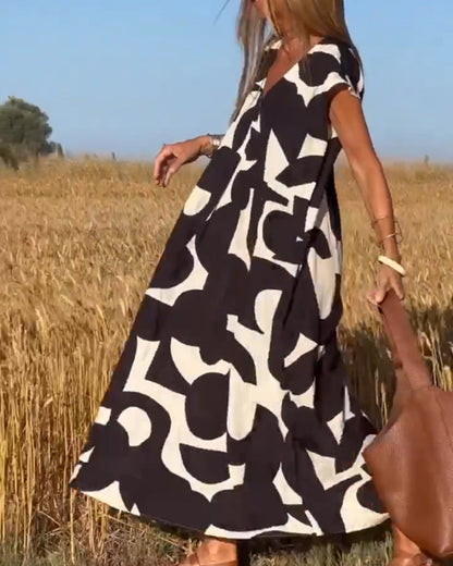Vestido estampado con escote en V y corte fluido – LYSÉA