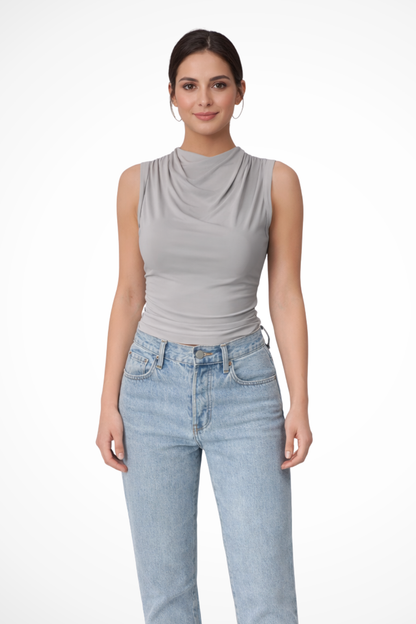 Kaia – Top sin mangas con cuello drapeado y peplum para mujer