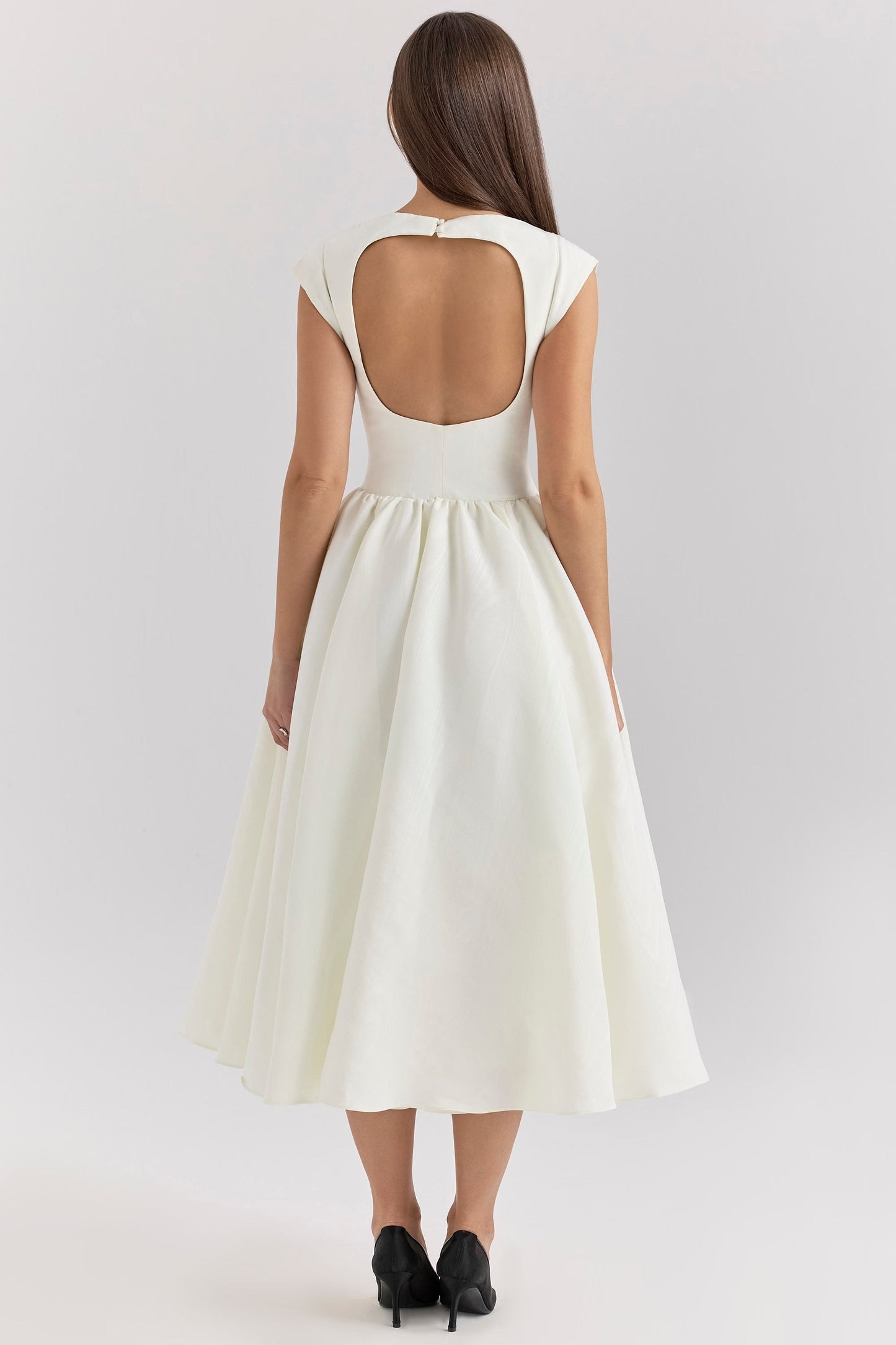 Elara – Vestido midi sin mangas con espalda descubierta y corte en línea A para mujer