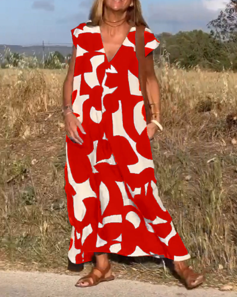 Vestido estampado con escote en V y corte fluido – STEPHARA