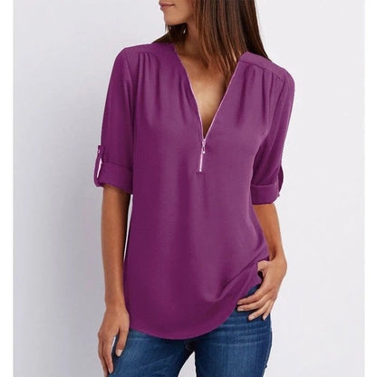Top relajado con diseño moderno y media cremallera para mujer – LYSANDRA