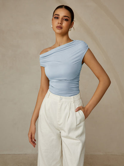 Aria – Camiseta sin mangas con cuello asimétrico para mujer