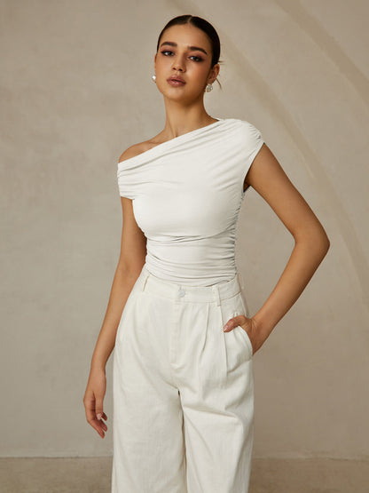 Aria – Camiseta sin mangas con cuello asimétrico para mujer