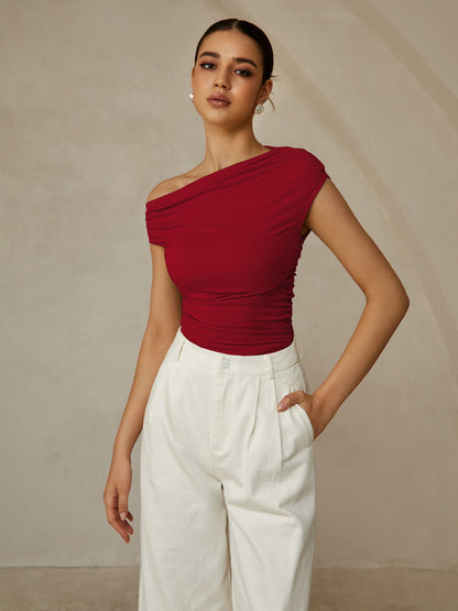 Aria – Camiseta sin mangas con cuello asimétrico para mujer