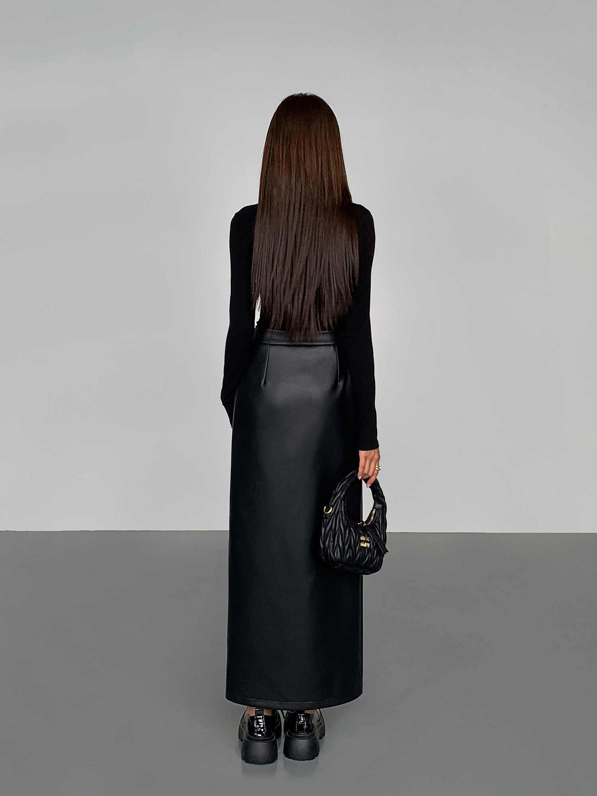Aurora – Falda midi de cuero sintético con abertura lateral para mujer