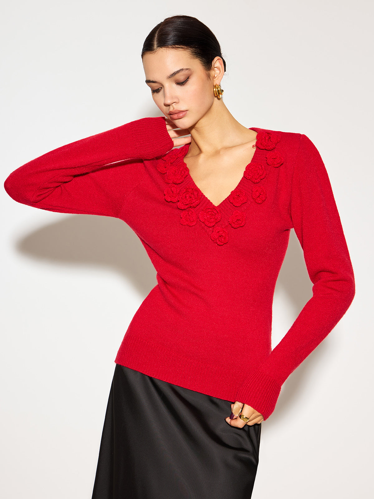 Florencia – Top de punto ceñido con escote en V y flores 3D para mujer