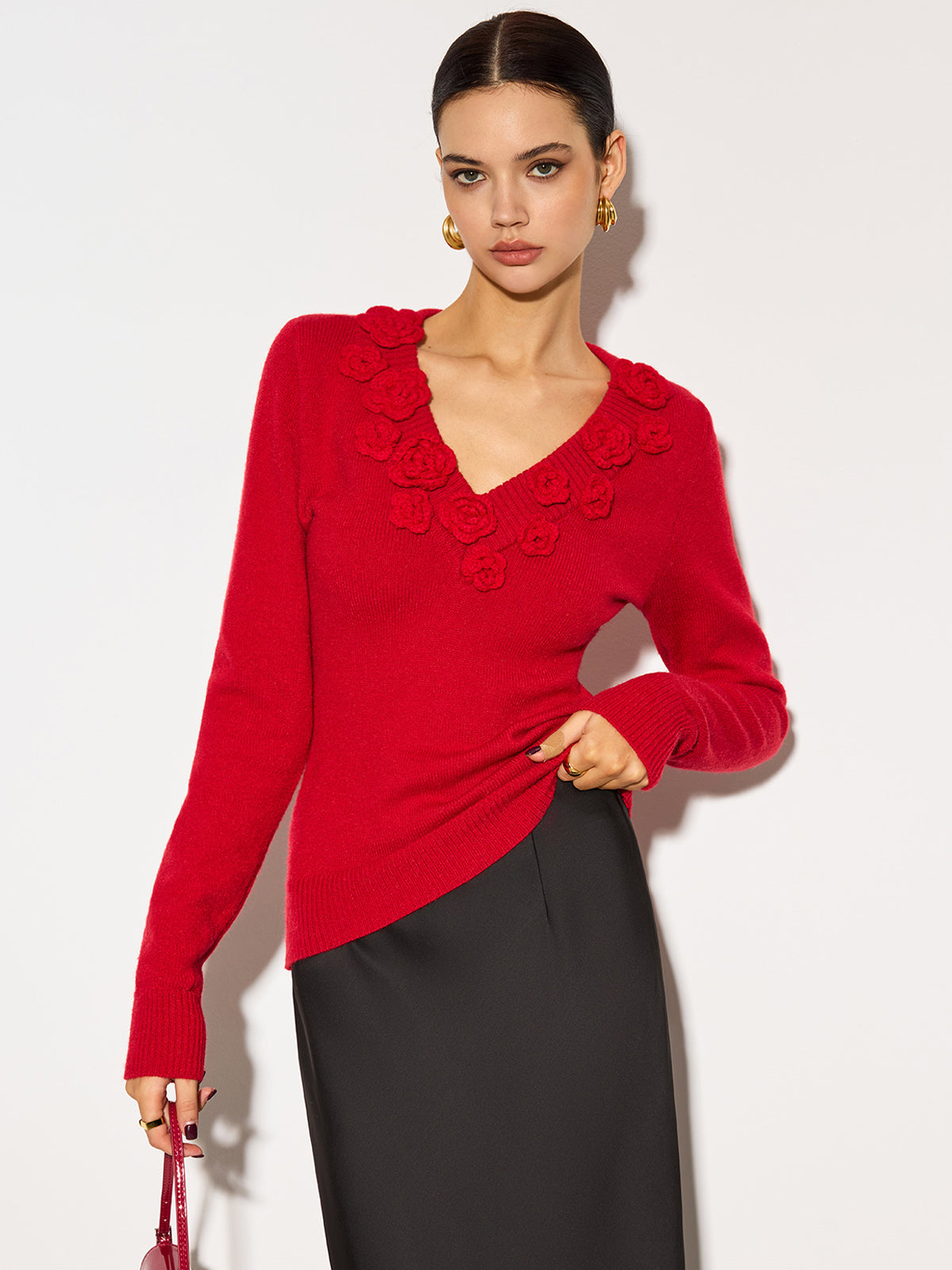 Florencia – Top de punto ceñido con escote en V y flores 3D para mujer
