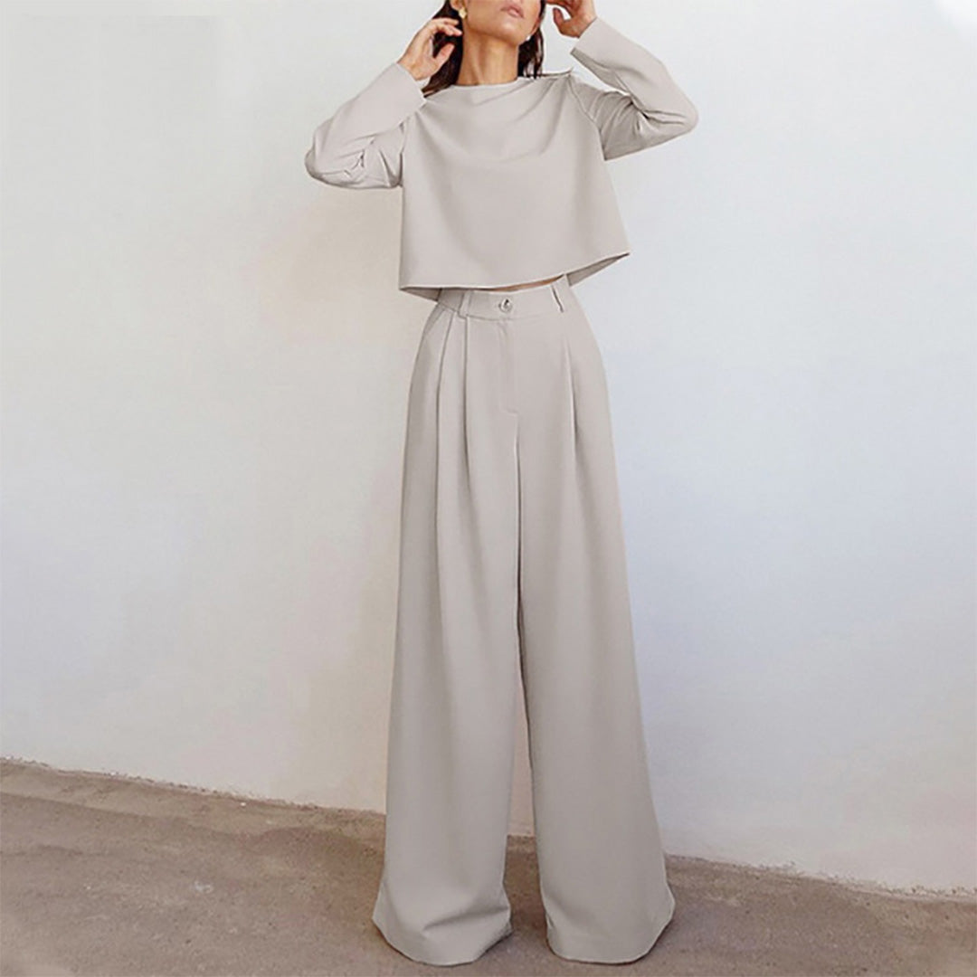 Conjunto elegante de dos piezas con top entallado y pantalón palazzo – CYRENA