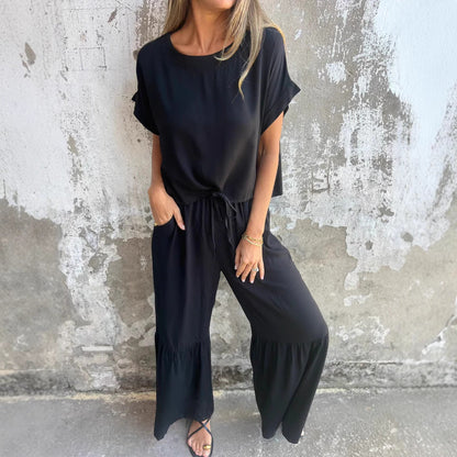 Conjunto de lino elegante con blusa fluida y pantalón relajado – ALTHEYA