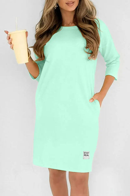 Vestido midi con cuello redondo y corte elegante – MERISSA
