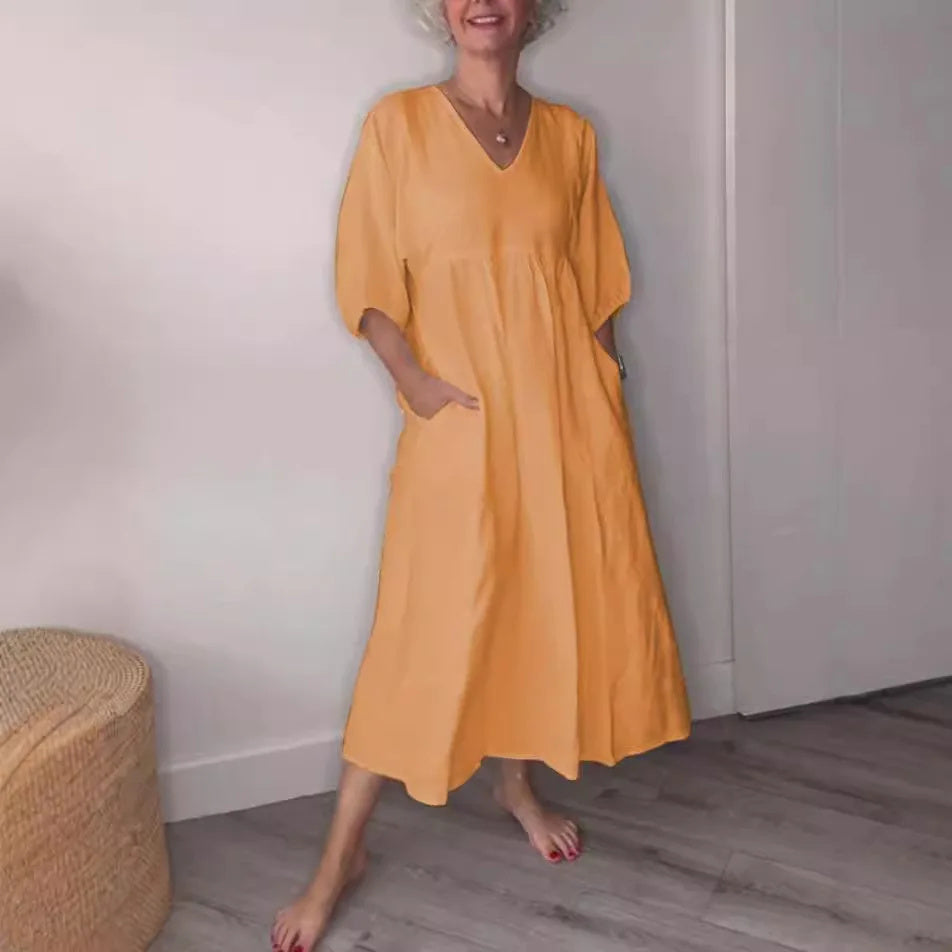 Vestido midi con escote en V, bolsillos y corte fluido – LUCIE