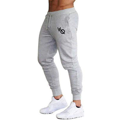 Pantalón deportivo slim fit con puños en los tobillos para hombre – DEXTER