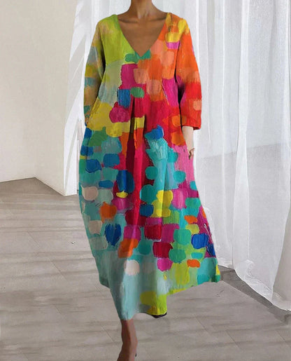 Vestido largo con escote en V y estampado artístico para invitada de boda – SERENA LUMINA