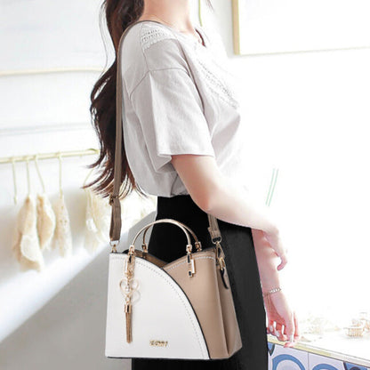 Bolso de mano lujoso con acabado elegante y correa ajustable – LOREVIA