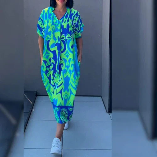 Vestido largo con estampado floral y corte fluido – ELEONORA
