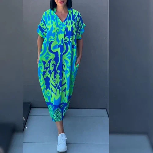Vestido largo con estampado floral y corte fluido – ELEONORA