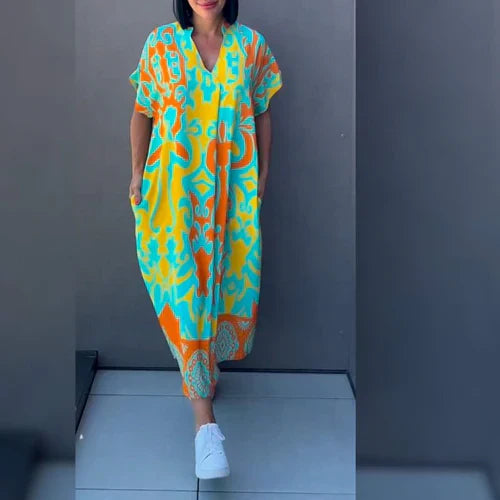 Vestido largo con estampado floral y corte fluido – ELEONORA