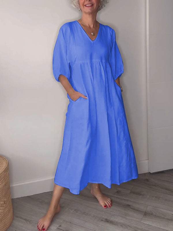 Vestido midi con escote en V, bolsillos y corte fluido – LUCIE