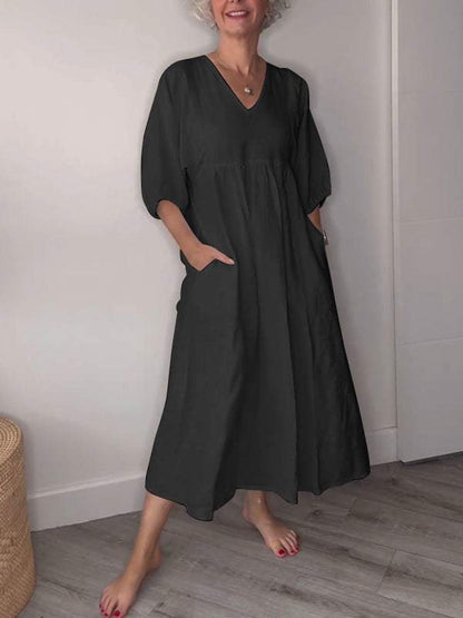 Vestido midi con escote en V, bolsillos y corte fluido – LUCIE
