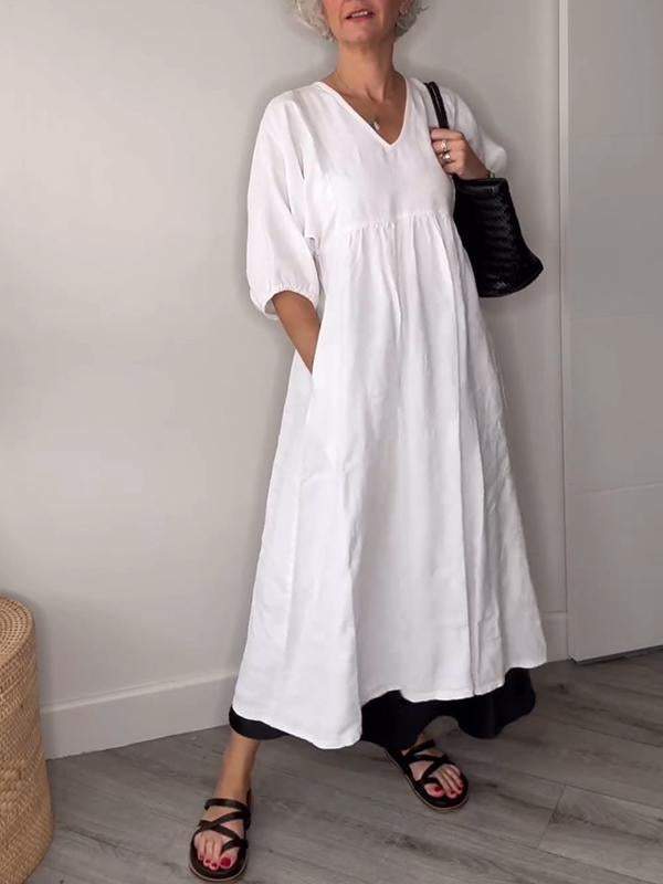 Vestido midi con escote en V, bolsillos y corte fluido – LUCIE