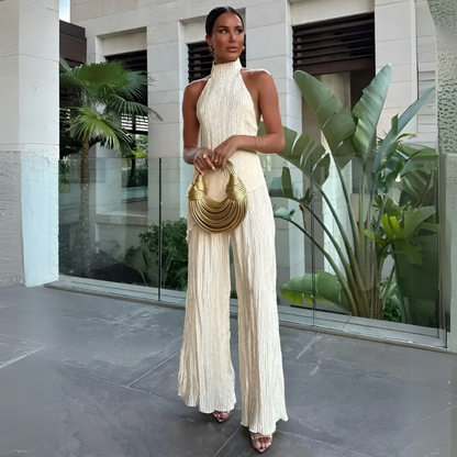 Seraphina – Mono elegante de pierna ancha con cuello halter y pliegues para mujer