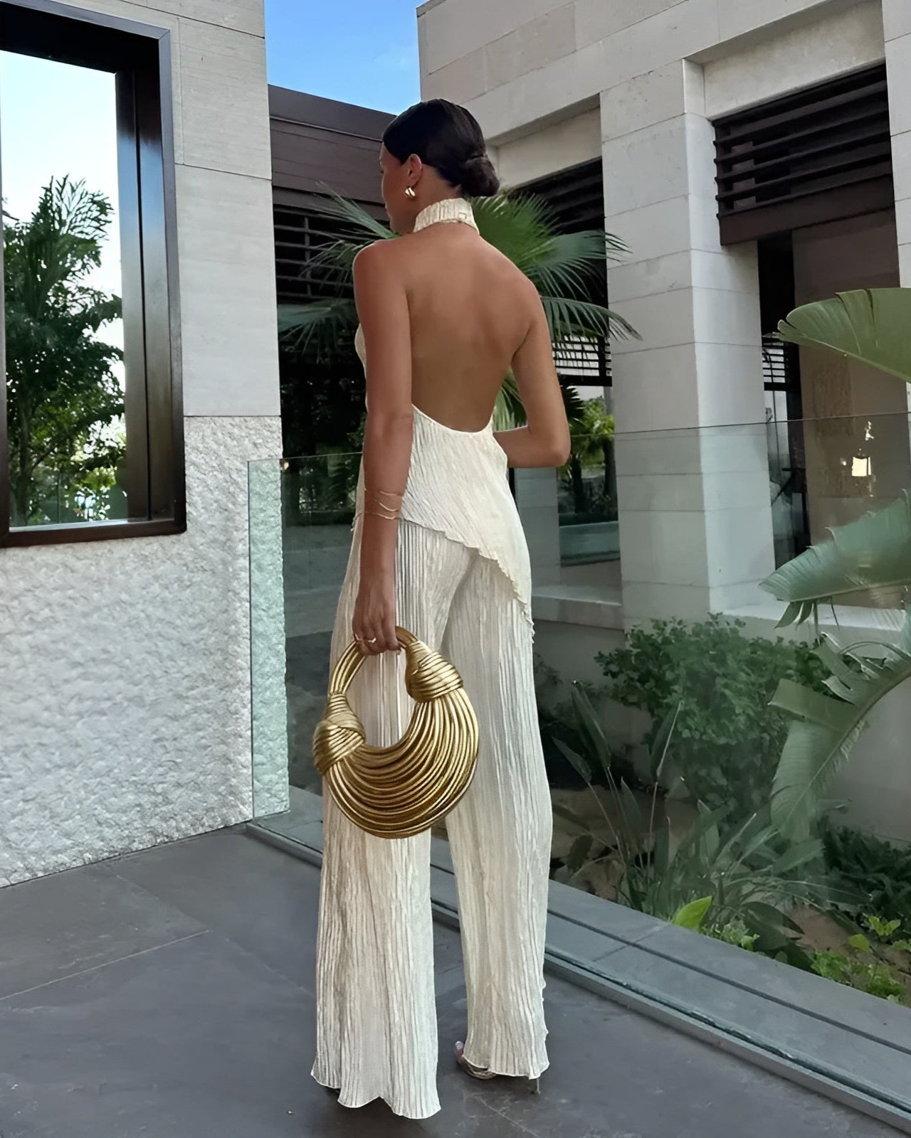 Seraphina – Mono elegante de pierna ancha con cuello halter y pliegues para mujer