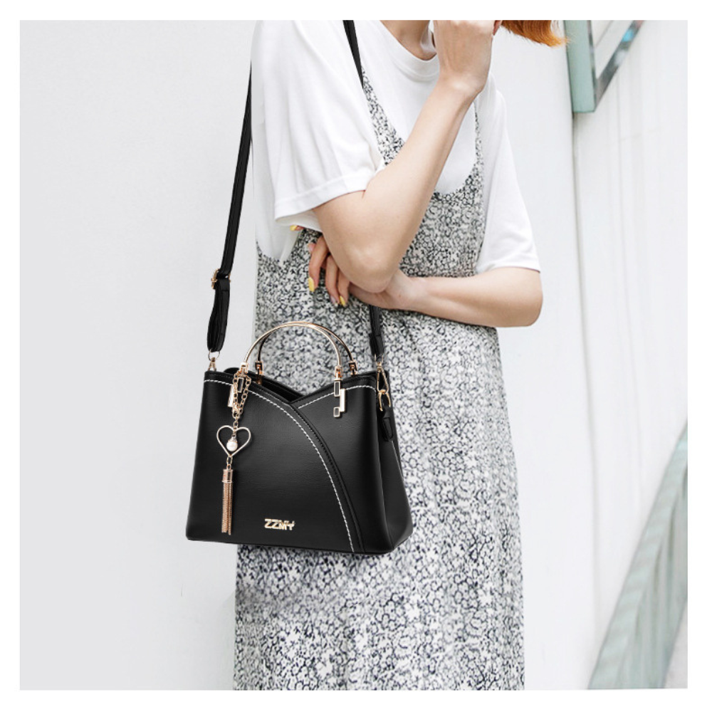 Bolso de mano lujoso con acabado elegante y correa ajustable – LOREVIA