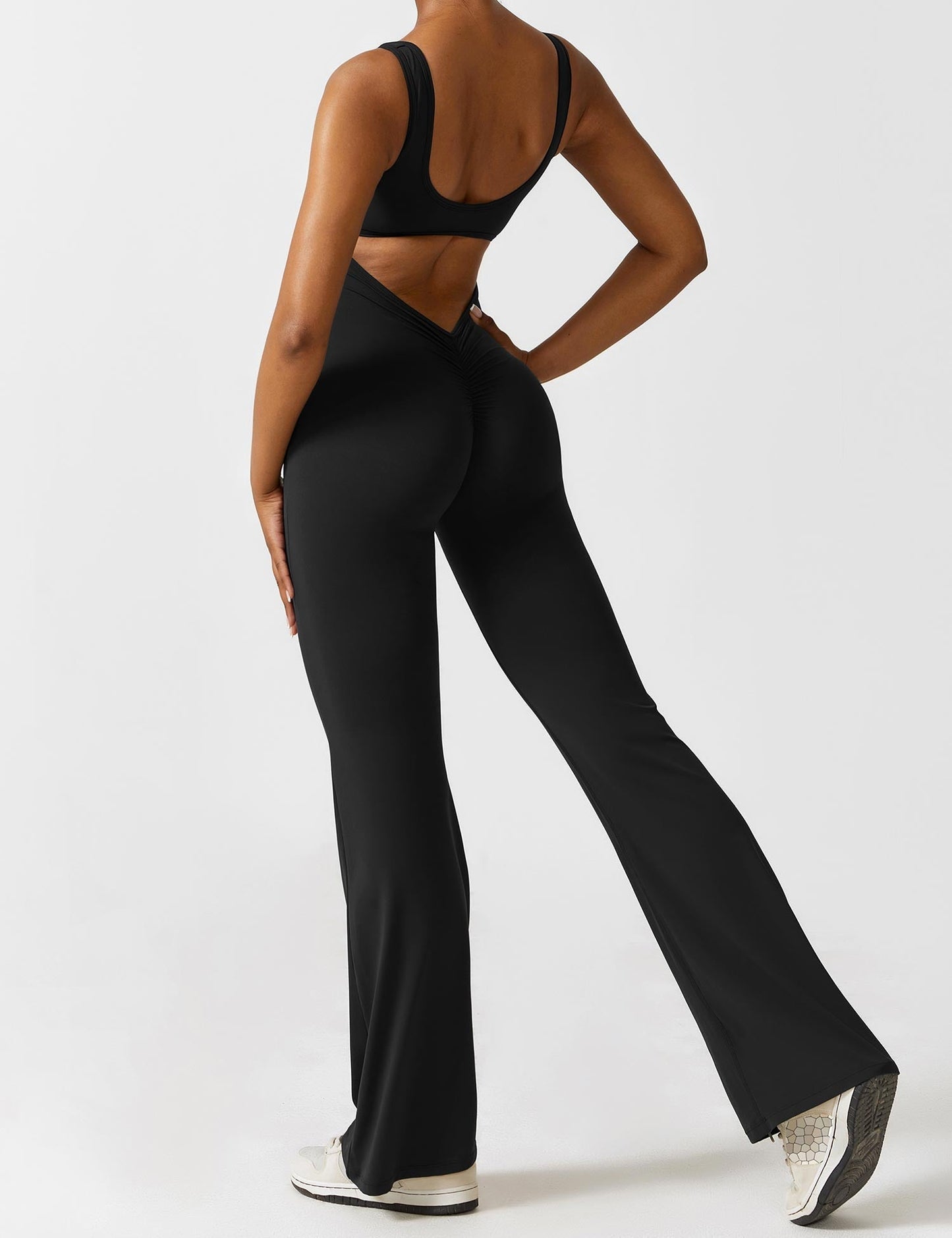 Elara – Mono elegante con espalda en V para mujer